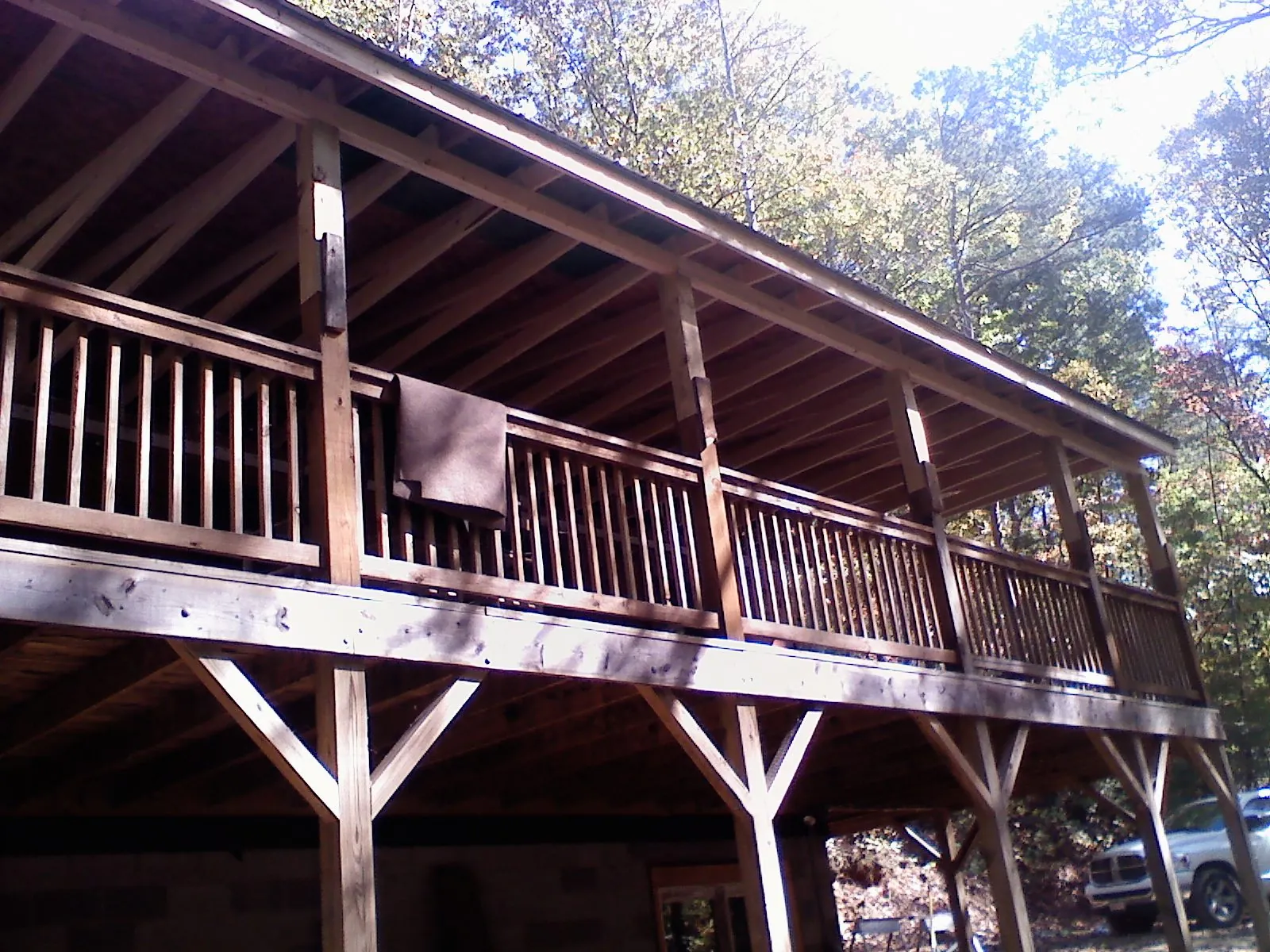 Timber framing under a new elevated porch and deck — Roof Leak Repair in Albertville by Roofing Brothers